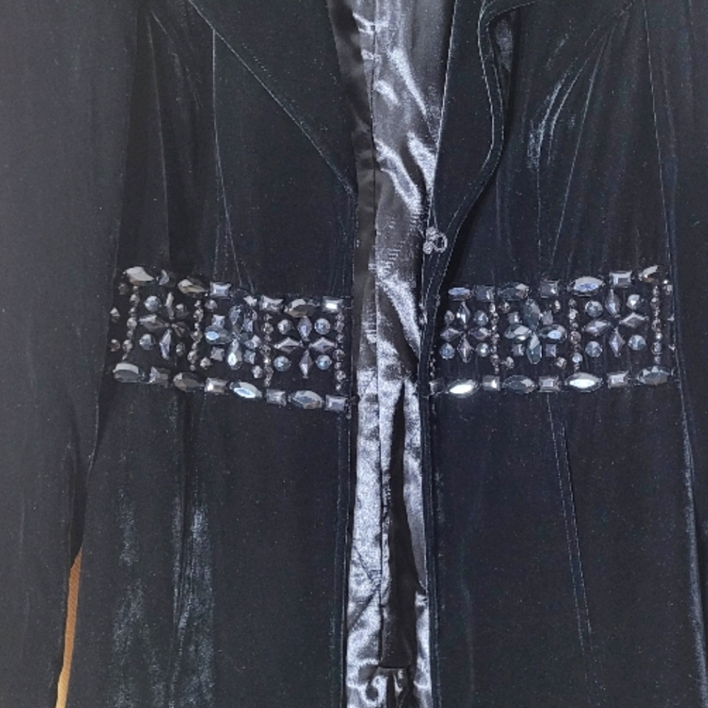 White House Black Market velvety black jacket with black polished accents.